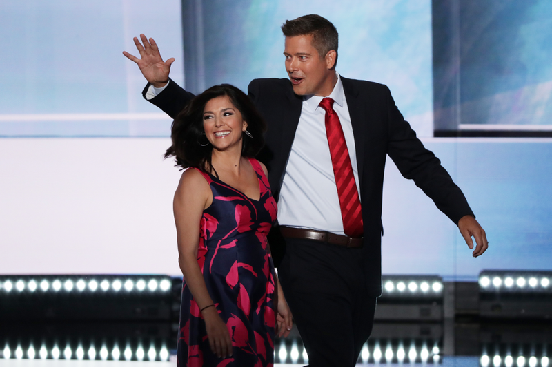 Rep. Sean Duffy (R-Wis.) with his wife, Rachel Campos-Duffy, walk onstage to deliver a speech on the first day of the Republican National Convention on July 18, 2016, at the Quicken Loans Arena in Cleveland.